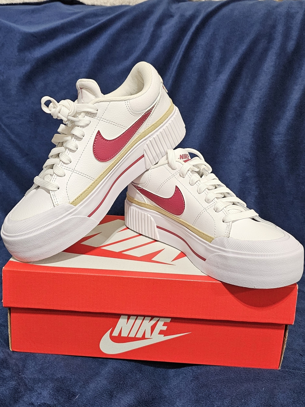 Nike Women’s White Sneakers with Pink Swoosh